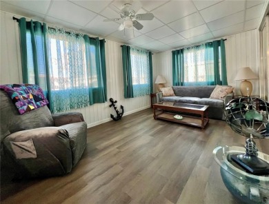 Welcome to this beautifully updated 2-bedroom, 2-bath home in on Fairway Village Golf Course in Florida - for sale on GolfHomes.com, golf home, golf lot