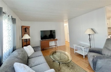Welcome to this beautifully updated 2-bedroom, 2-bath home in on Fairway Village Golf Course in Florida - for sale on GolfHomes.com, golf home, golf lot