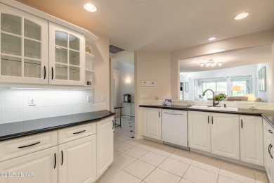 Beautifully updated end-unit 2/2 condo perfectly situated along on Spruce Creek Golf Club in Florida - for sale on GolfHomes.com, golf home, golf lot
