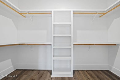 Experience the perfect blend of modern luxury and coastal charm on Brick Landing Plantation Yacht and Golf Club in North Carolina - for sale on GolfHomes.com, golf home, golf lot