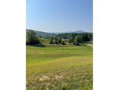 Golf Course lot surrounded by majestic mountain views.  This on Mountain Harbour Golf Club in North Carolina - for sale on GolfHomes.com, golf home, golf lot