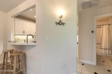 Beautifully updated end-unit 2/2 condo perfectly situated along on Spruce Creek Golf Club in Florida - for sale on GolfHomes.com, golf home, golf lot