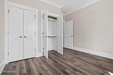 Experience the perfect blend of modern luxury and coastal charm on Brick Landing Plantation Yacht and Golf Club in North Carolina - for sale on GolfHomes.com, golf home, golf lot