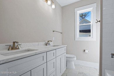 Experience the perfect blend of modern luxury and coastal charm on Brick Landing Plantation Yacht and Golf Club in North Carolina - for sale on GolfHomes.com, golf home, golf lot