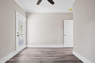 Experience the perfect blend of modern luxury and coastal charm on Brick Landing Plantation Yacht and Golf Club in North Carolina - for sale on GolfHomes.com, golf home, golf lot