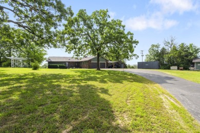 The ultimate vacation retreat awaits! Escape to 12 Woodland Dr on Kimberling City Golf Club in Missouri - for sale on GolfHomes.com, golf home, golf lot