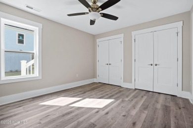 Experience the perfect blend of modern luxury and coastal charm on Brick Landing Plantation Yacht and Golf Club in North Carolina - for sale on GolfHomes.com, golf home, golf lot