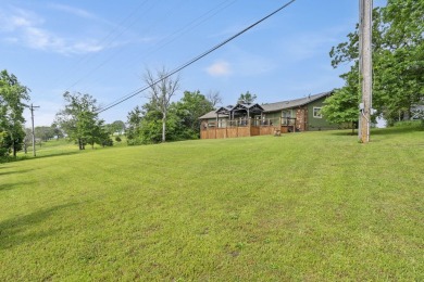 The ultimate vacation retreat awaits! Escape to 12 Woodland Dr on Kimberling City Golf Club in Missouri - for sale on GolfHomes.com, golf home, golf lot
