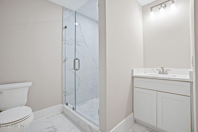 Experience the perfect blend of modern luxury and coastal charm on Brick Landing Plantation Yacht and Golf Club in North Carolina - for sale on GolfHomes.com, golf home, golf lot