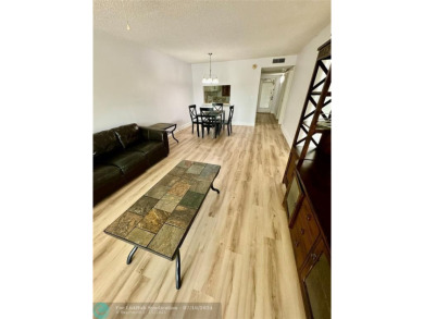 Beautiful bright and airy unit overlooking the lake and on Pine Island Ridge Country Club in Florida - for sale on GolfHomes.com, golf home, golf lot