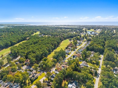 Experience the perfect blend of modern luxury and coastal charm on Brick Landing Plantation Yacht and Golf Club in North Carolina - for sale on GolfHomes.com, golf home, golf lot