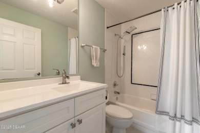 Beautifully updated end-unit 2/2 condo perfectly situated along on Spruce Creek Golf Club in Florida - for sale on GolfHomes.com, golf home, golf lot