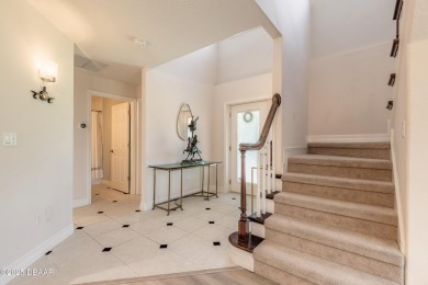 Beautifully updated end-unit 2/2 condo perfectly situated along on Spruce Creek Golf Club in Florida - for sale on GolfHomes.com, golf home, golf lot