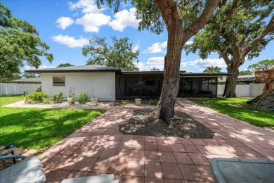 Welcome to your backyard paradise! Perfect for family evenings on Bent Tree Country Club in Florida - for sale on GolfHomes.com, golf home, golf lot