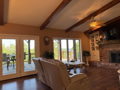 The ultimate vacation retreat awaits! Escape to 12 Woodland Dr on Kimberling City Golf Club in Missouri - for sale on GolfHomes.com, golf home, golf lot