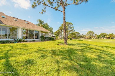 Beautifully updated end-unit 2/2 condo perfectly situated along on Spruce Creek Golf Club in Florida - for sale on GolfHomes.com, golf home, golf lot