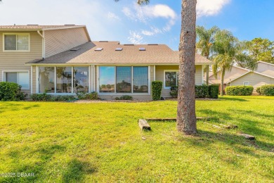 Beautifully updated end-unit 2/2 condo perfectly situated along on Spruce Creek Golf Club in Florida - for sale on GolfHomes.com, golf home, golf lot