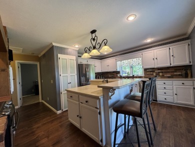 The ultimate vacation retreat awaits! Escape to 12 Woodland Dr on Kimberling City Golf Club in Missouri - for sale on GolfHomes.com, golf home, golf lot