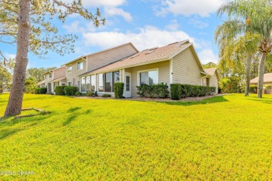 Beautifully updated end-unit 2/2 condo perfectly situated along on Spruce Creek Golf Club in Florida - for sale on GolfHomes.com, golf home, golf lot
