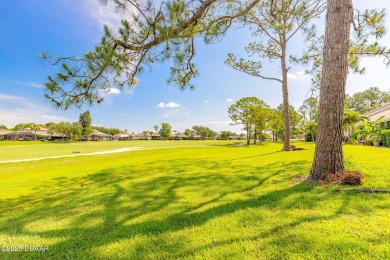Beautifully updated end-unit 2/2 condo perfectly situated along on Spruce Creek Golf Club in Florida - for sale on GolfHomes.com, golf home, golf lot