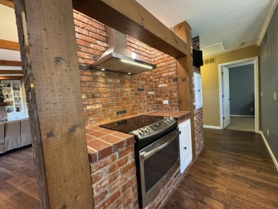 The ultimate vacation retreat awaits! Escape to 12 Woodland Dr on Kimberling City Golf Club in Missouri - for sale on GolfHomes.com, golf home, golf lot