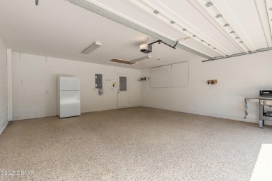 Beautifully updated end-unit 2/2 condo perfectly situated along on Spruce Creek Golf Club in Florida - for sale on GolfHomes.com, golf home, golf lot