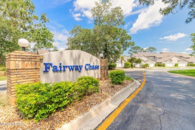 Beautifully updated end-unit 2/2 condo perfectly situated along on Spruce Creek Golf Club in Florida - for sale on GolfHomes.com, golf home, golf lot