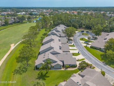 Beautifully updated end-unit 2/2 condo perfectly situated along on Spruce Creek Golf Club in Florida - for sale on GolfHomes.com, golf home, golf lot