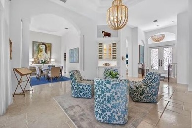 RARE PRISTINE TURN KEY OPPORTUNITY. Nestled away on a quiet on Frenchmans Reserve in Florida - for sale on GolfHomes.com, golf home, golf lot