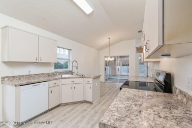 UPDATED, delightful 2 bedroom, PLUS a flex room, 2 bath, 1400+/- on Twisted Oaks Golf Club in Florida - for sale on GolfHomes.com, golf home, golf lot