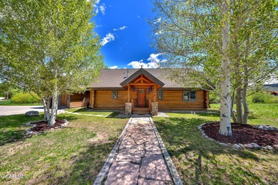 Tucked in the heart of Granby, this enchanting log cabin on Grand Elk Ranch and Club in Colorado - for sale on GolfHomes.com, golf home, golf lot