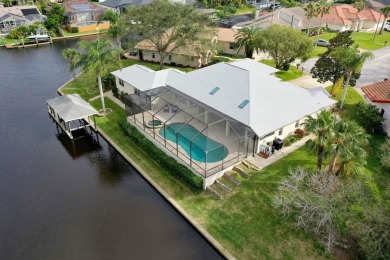 Escape To Waterfront Paradise In Palm Coast's Coveted C-section on Palm Harbor Golf Club in Florida - for sale on GolfHomes.com, golf home, golf lot