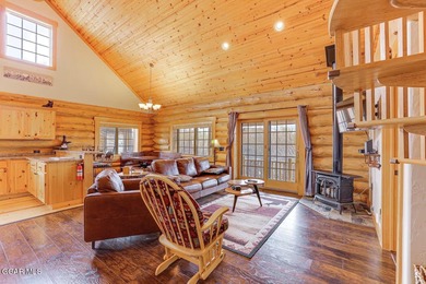 Tucked in the heart of Granby, this enchanting log cabin on Grand Elk Ranch and Club in Colorado - for sale on GolfHomes.com, golf home, golf lot