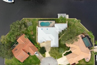 Escape To Waterfront Paradise In Palm Coast's Coveted C-section on Palm Harbor Golf Club in Florida - for sale on GolfHomes.com, golf home, golf lot