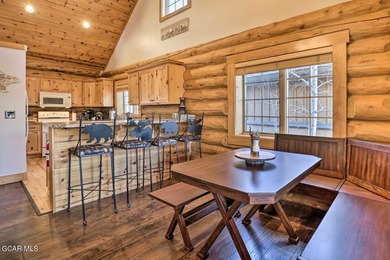 Tucked in the heart of Granby, this enchanting log cabin on Grand Elk Ranch and Club in Colorado - for sale on GolfHomes.com, golf home, golf lot