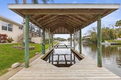 Escape To Waterfront Paradise In Palm Coast's Coveted C-section on Palm Harbor Golf Club in Florida - for sale on GolfHomes.com, golf home, golf lot