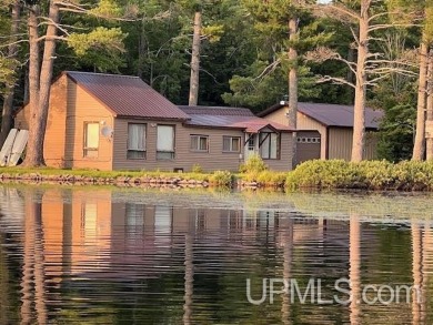 Escape to your own personal paradise nestled on 4.29 acres on Wyandotte Hills Golf Course in Michigan - for sale on GolfHomes.com, golf home, golf lot