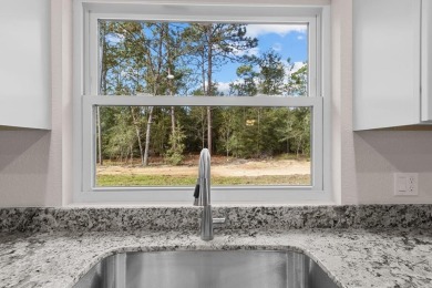 Welcome to your dream home in the sought-after Williston on Williston Highlands Golf and Country Club in Florida - for sale on GolfHomes.com, golf home, golf lot