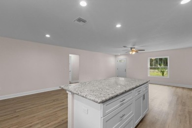 Welcome to your dream home in the sought-after Williston on Williston Highlands Golf and Country Club in Florida - for sale on GolfHomes.com, golf home, golf lot