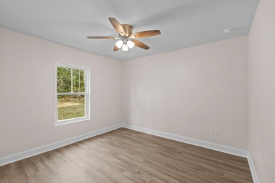 Welcome to your dream home in the sought-after Williston on Williston Highlands Golf and Country Club in Florida - for sale on GolfHomes.com, golf home, golf lot