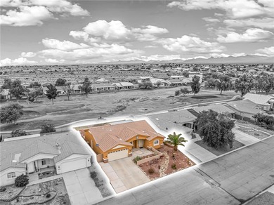 Move-in ready home located along the Huukan Golf Course in the on Desert Lakes Golf Course in Arizona - for sale on GolfHomes.com, golf home, golf lot