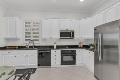 Southern exposure with beautiful lake and golf course views from on The Rookery At Marco in Florida - for sale on GolfHomes.com, golf home, golf lot