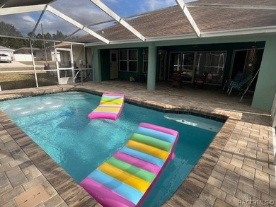 Beautiful modern Citrus Springs 3 bedrooms 2 bathrooms pool home on Citrus Springs Country Club in Florida - for sale on GolfHomes.com, golf home, golf lot