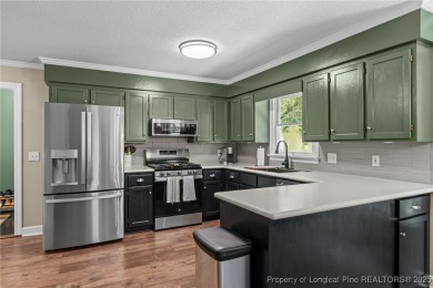 Step into this 3 bedroom, 2.5 bath gem in Fairway Woods. You'll on Sanford Municipal Golf Course in North Carolina - for sale on GolfHomes.com, golf home, golf lot