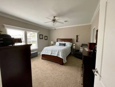 PRICE JUST IMPROVED on This Blue Coral model AND it has a WATER on Water Oak Country Club Estates in Florida - for sale on GolfHomes.com, golf home, golf lot