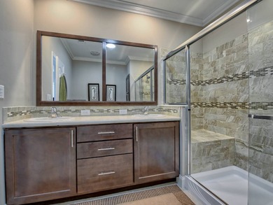 PRICE JUST IMPROVED on This Blue Coral model AND it has a WATER on Water Oak Country Club Estates in Florida - for sale on GolfHomes.com, golf home, golf lot