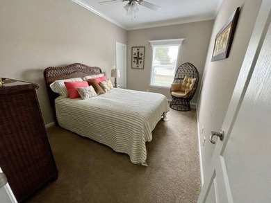 PRICE JUST IMPROVED on This Blue Coral model AND it has a WATER on Water Oak Country Club Estates in Florida - for sale on GolfHomes.com, golf home, golf lot