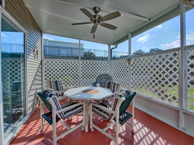 PRICE JUST IMPROVED on This Blue Coral model AND it has a WATER on Water Oak Country Club Estates in Florida - for sale on GolfHomes.com, golf home, golf lot