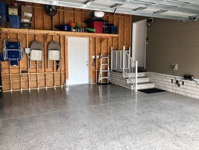 PRICE JUST IMPROVED on This Blue Coral model AND it has a WATER on Water Oak Country Club Estates in Florida - for sale on GolfHomes.com, golf home, golf lot