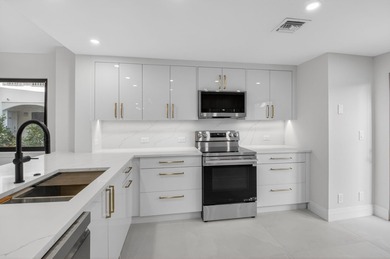 Meticulously upgraded, vibrant first floor 2 bedroom 2 bath on Gleneagles Golf and Country Club in Florida - for sale on GolfHomes.com, golf home, golf lot